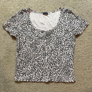 Brandy Melville black and white cheetah print button front tee